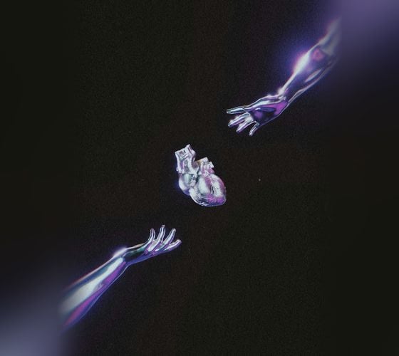 Two hands reaching toward each other